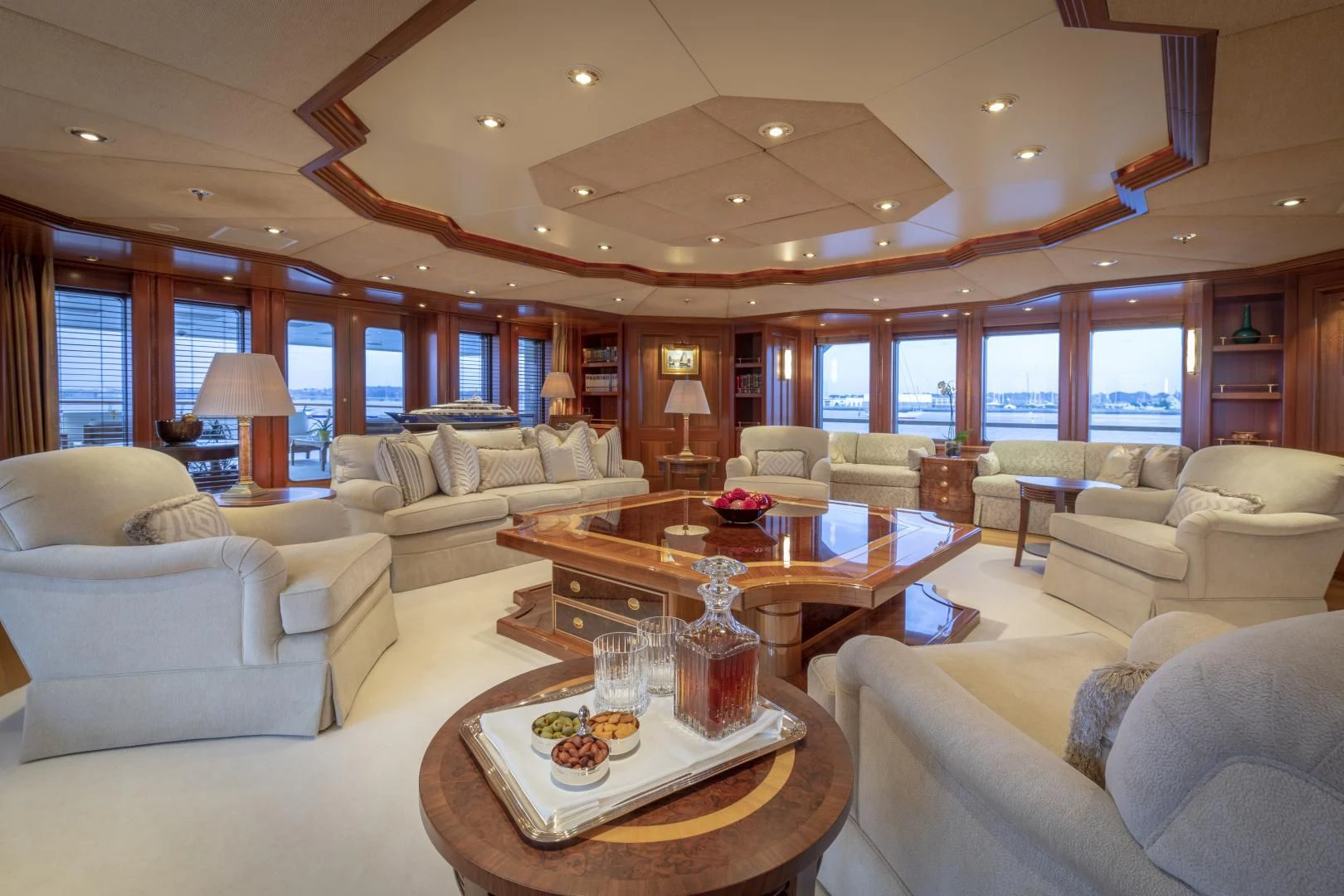 a living room with a large window aboard LAUREL Yacht for Charter