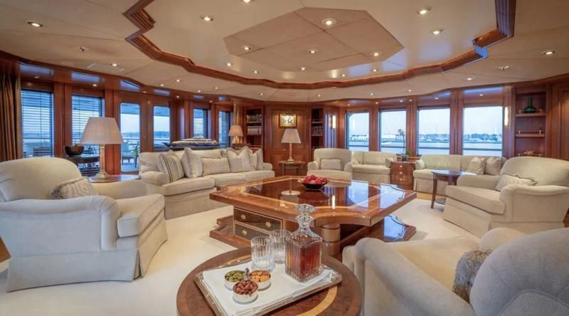 a living room with a large window aboard LAUREL Yacht for Charter
