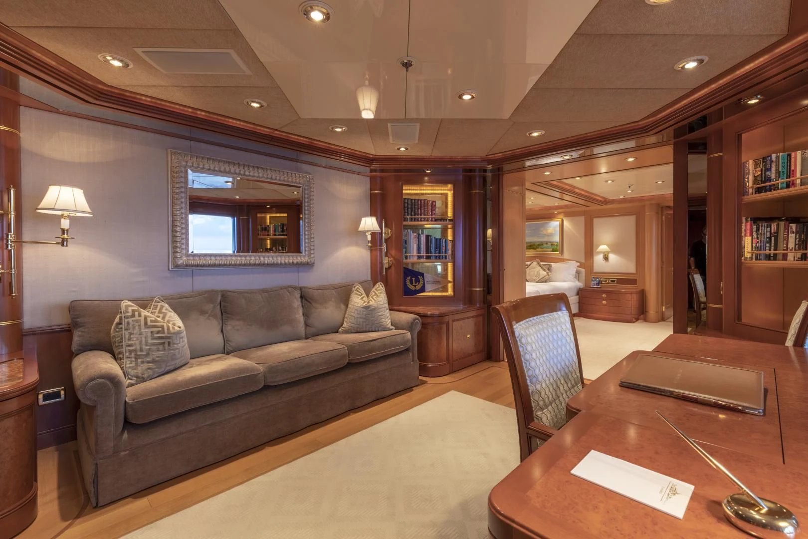 a living room with a couch and a coffee table aboard LAUREL Yacht for Charter
