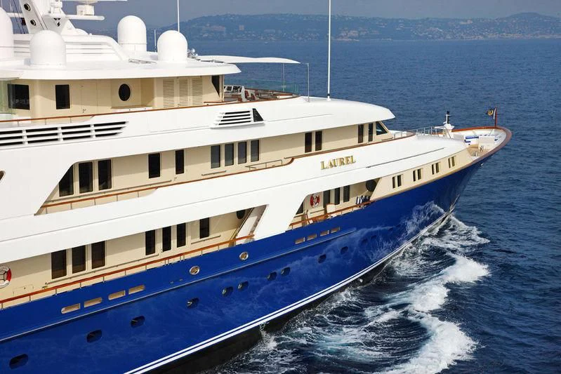 a large white boat on the water aboard LAUREL Yacht for Charter
