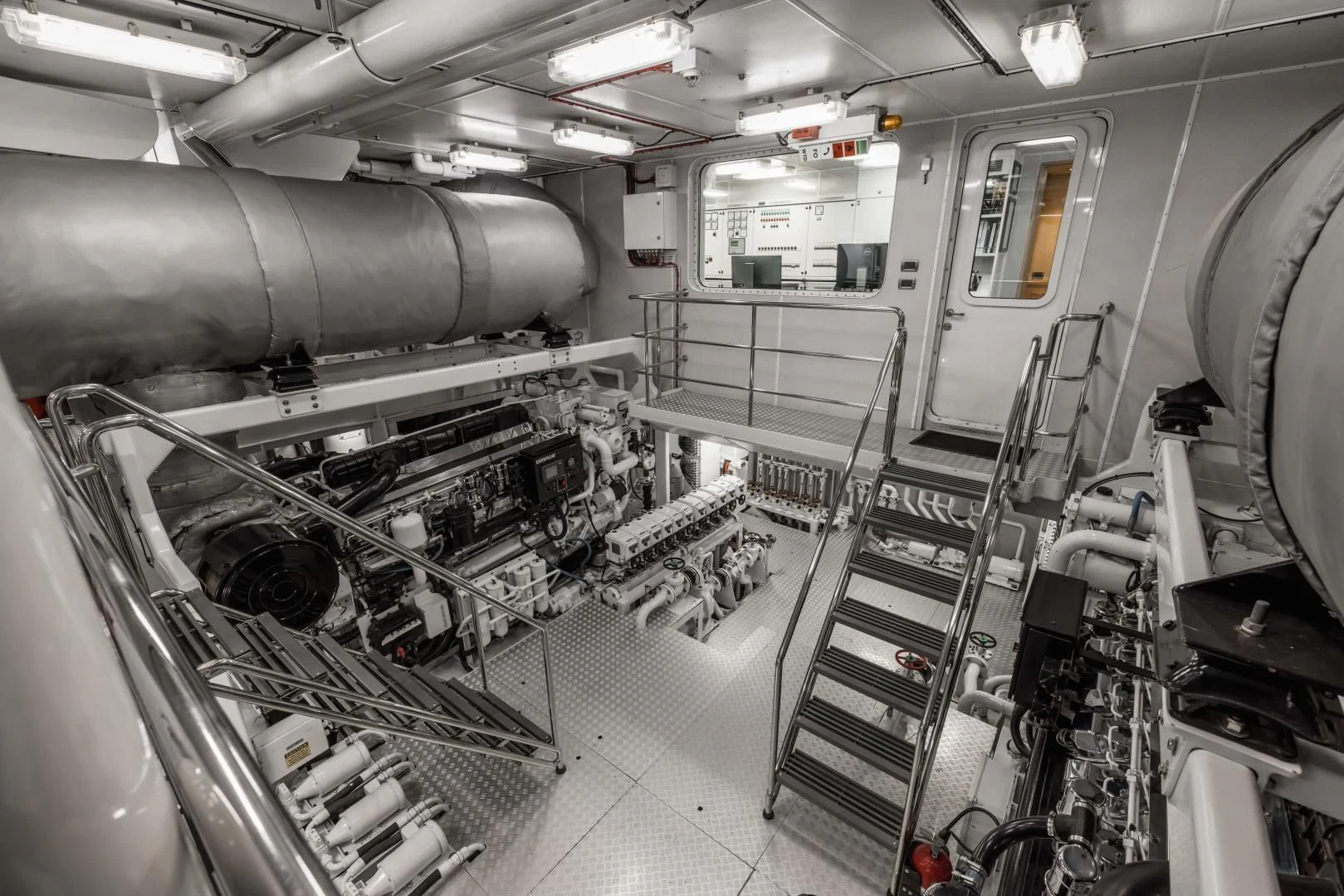 a large machine in a room aboard LAUREL Yacht for Charter