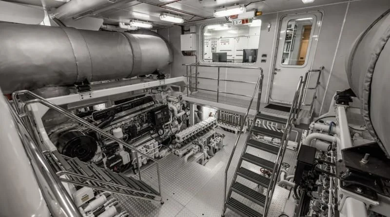 a large metal cylinder in a factory aboard LAUREL Yacht for Charter