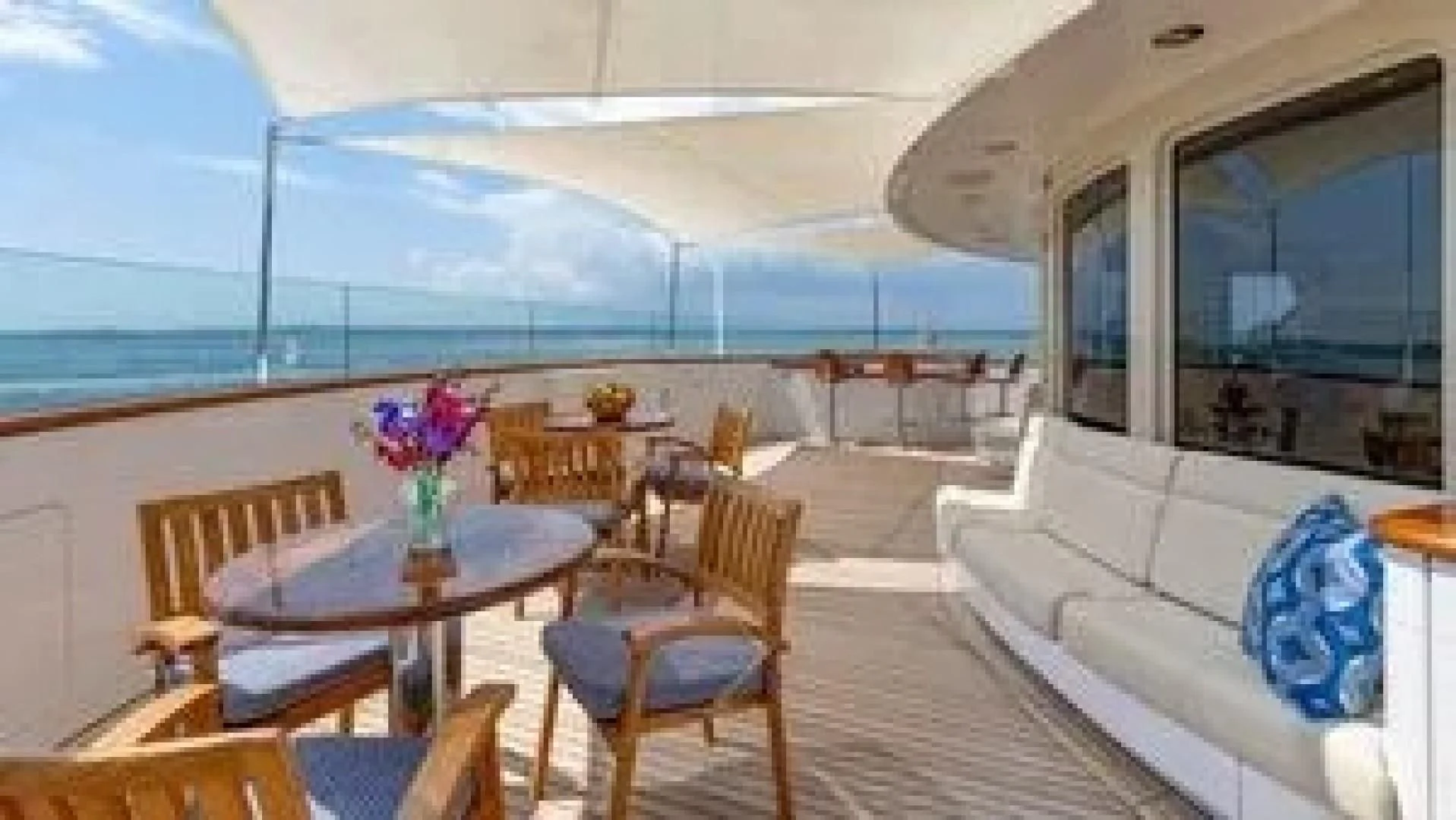 a room with a table and chairs aboard LAUREL Yacht for Charter