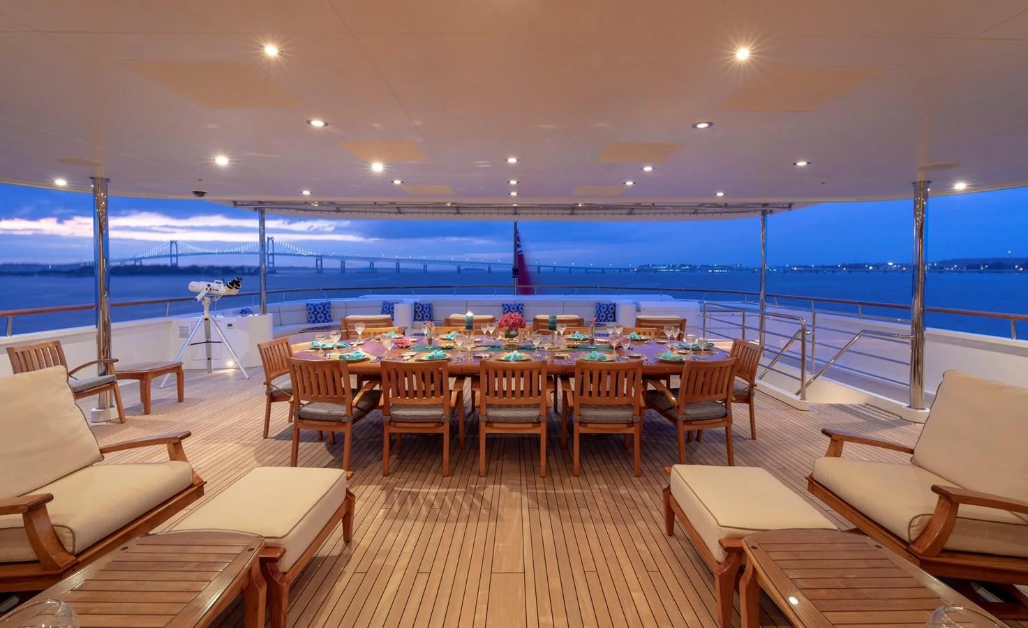 a room with a table and chairs aboard LAUREL Yacht for Charter