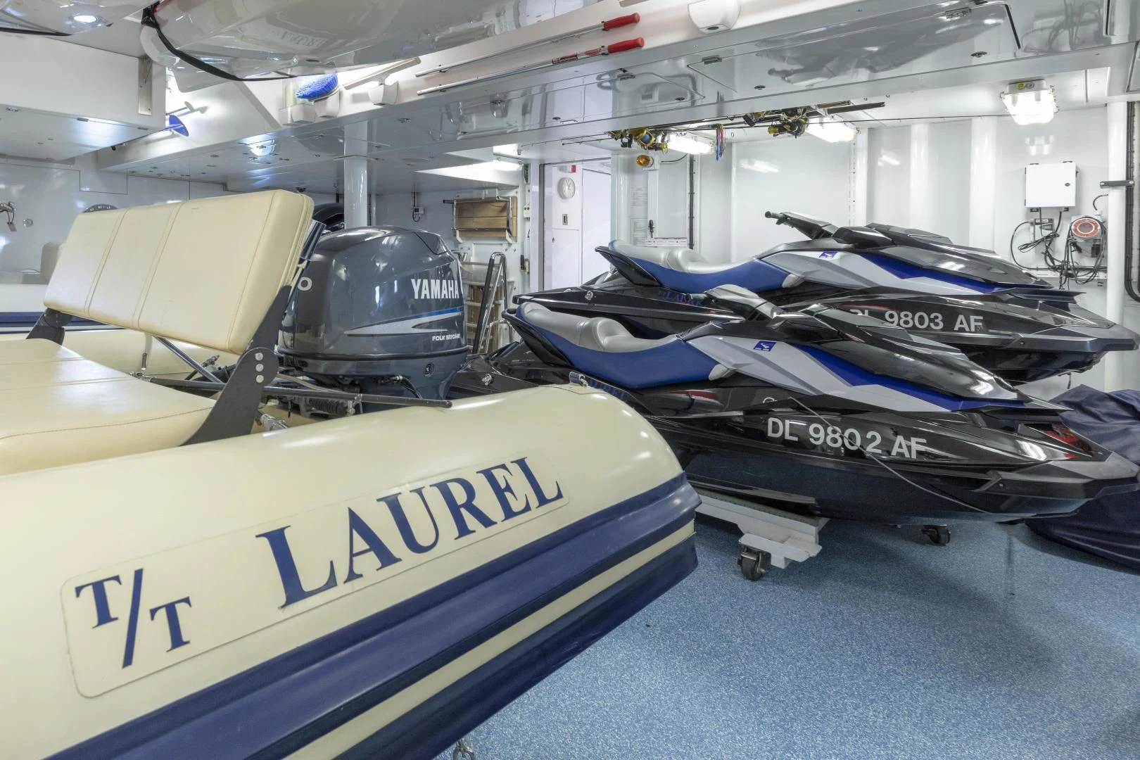 a group of cars in a factory aboard LAUREL Yacht for Charter