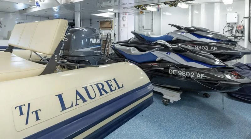 a car on a platform aboard LAUREL Yacht for Charter