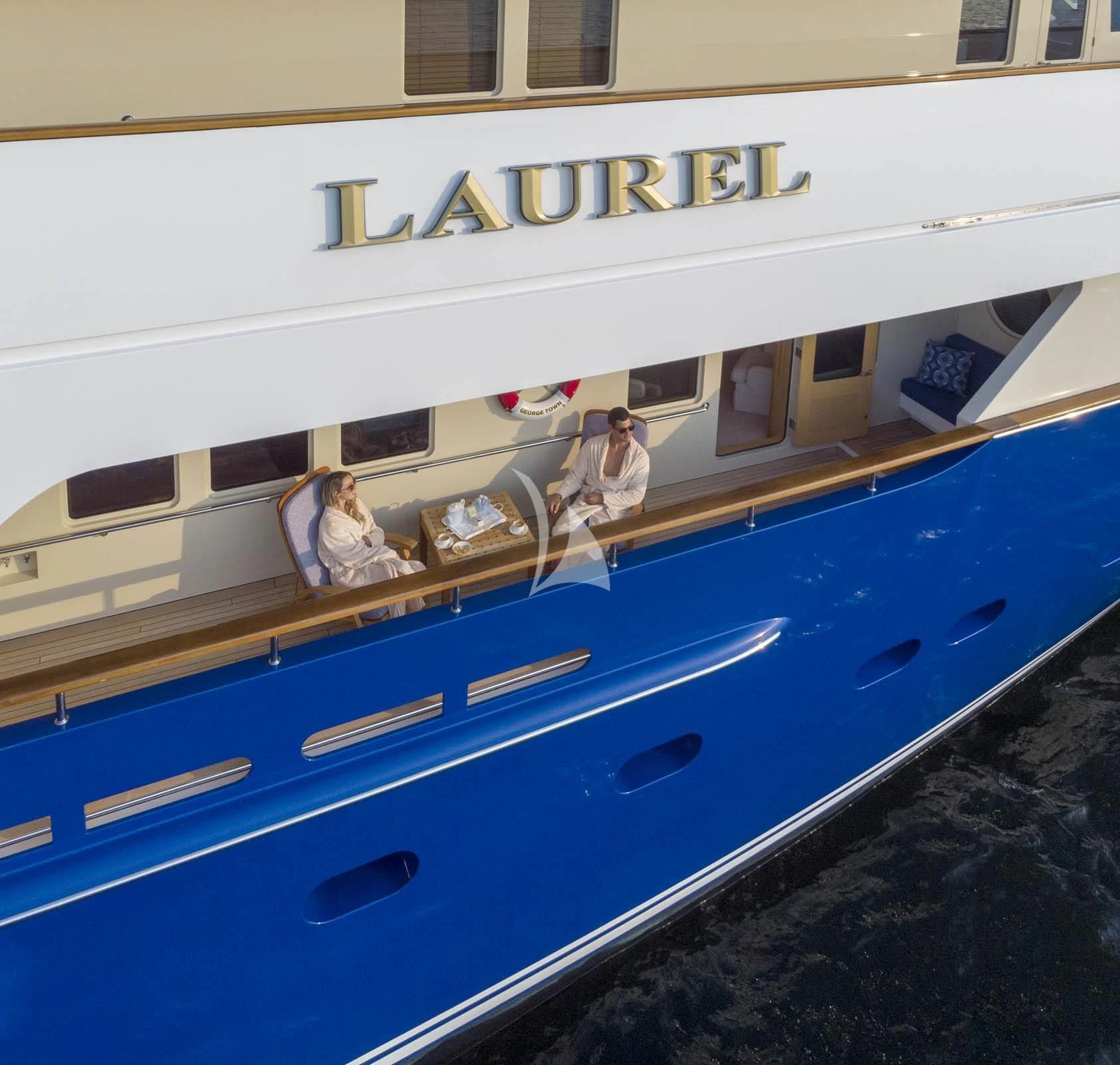 a boat with a person on the front aboard LAUREL Yacht for Charter