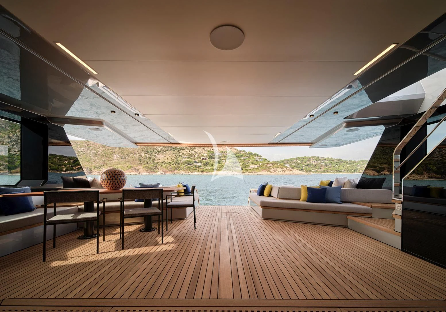 a room with a wood floor and a couch and a pool aboard BAD MUTHA Yacht for Sale