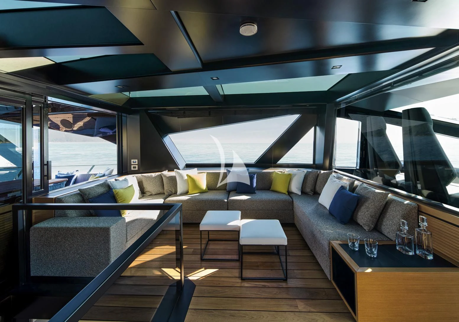 a room with a couch and a table aboard BAD MUTHA Yacht for Sale