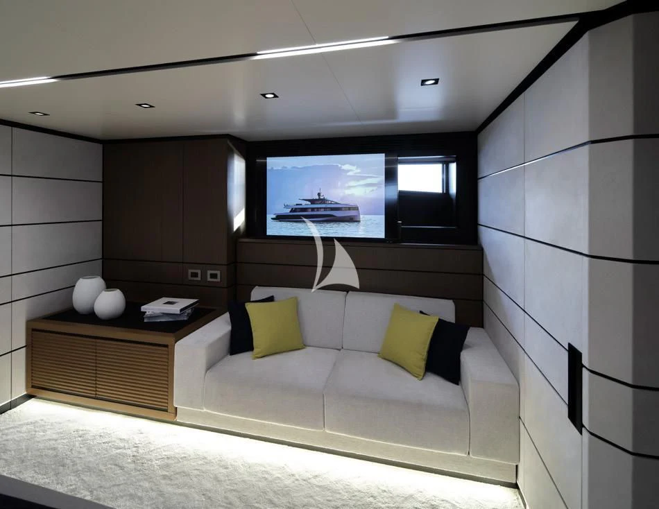 a room with a couch and a tv aboard BAD MUTHA Yacht for Sale