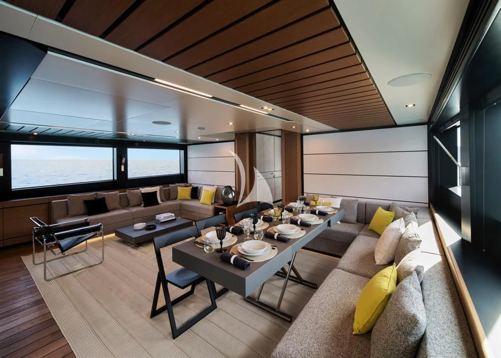 a modern living room with a large window aboard BAD MUTHA Yacht for Sale