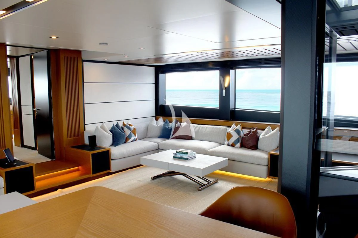 a living room with a large window aboard BAD MUTHA Yacht for Sale