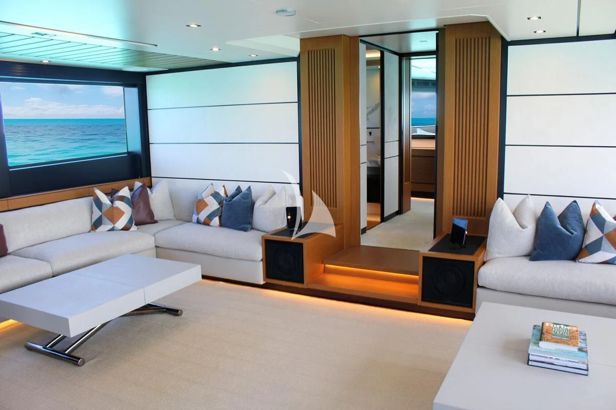 a living room with a large window aboard BAD MUTHA Yacht for Sale
