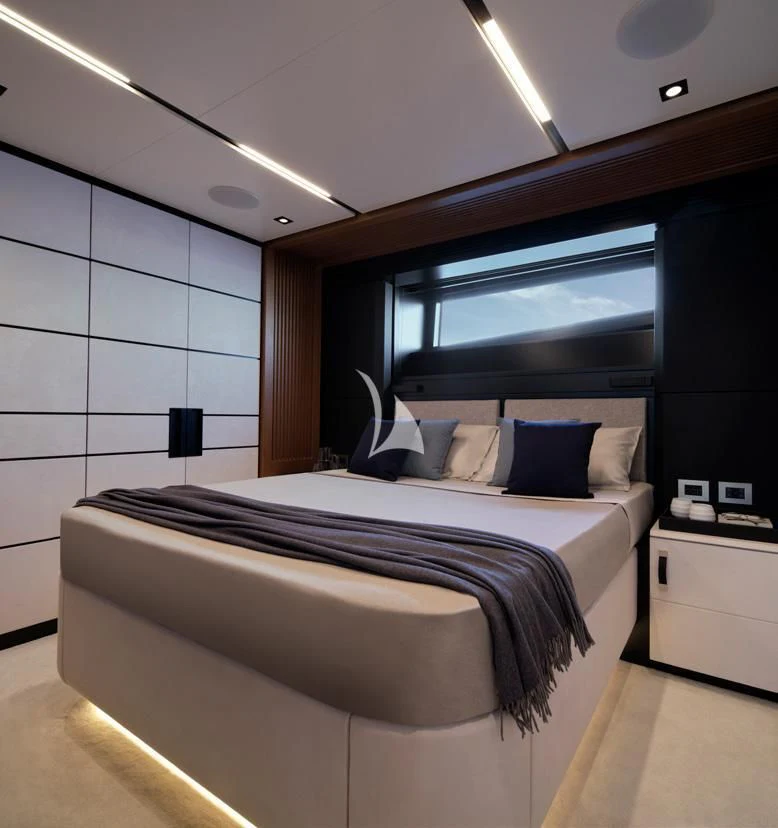 a bed in a room aboard BAD MUTHA Yacht for Sale