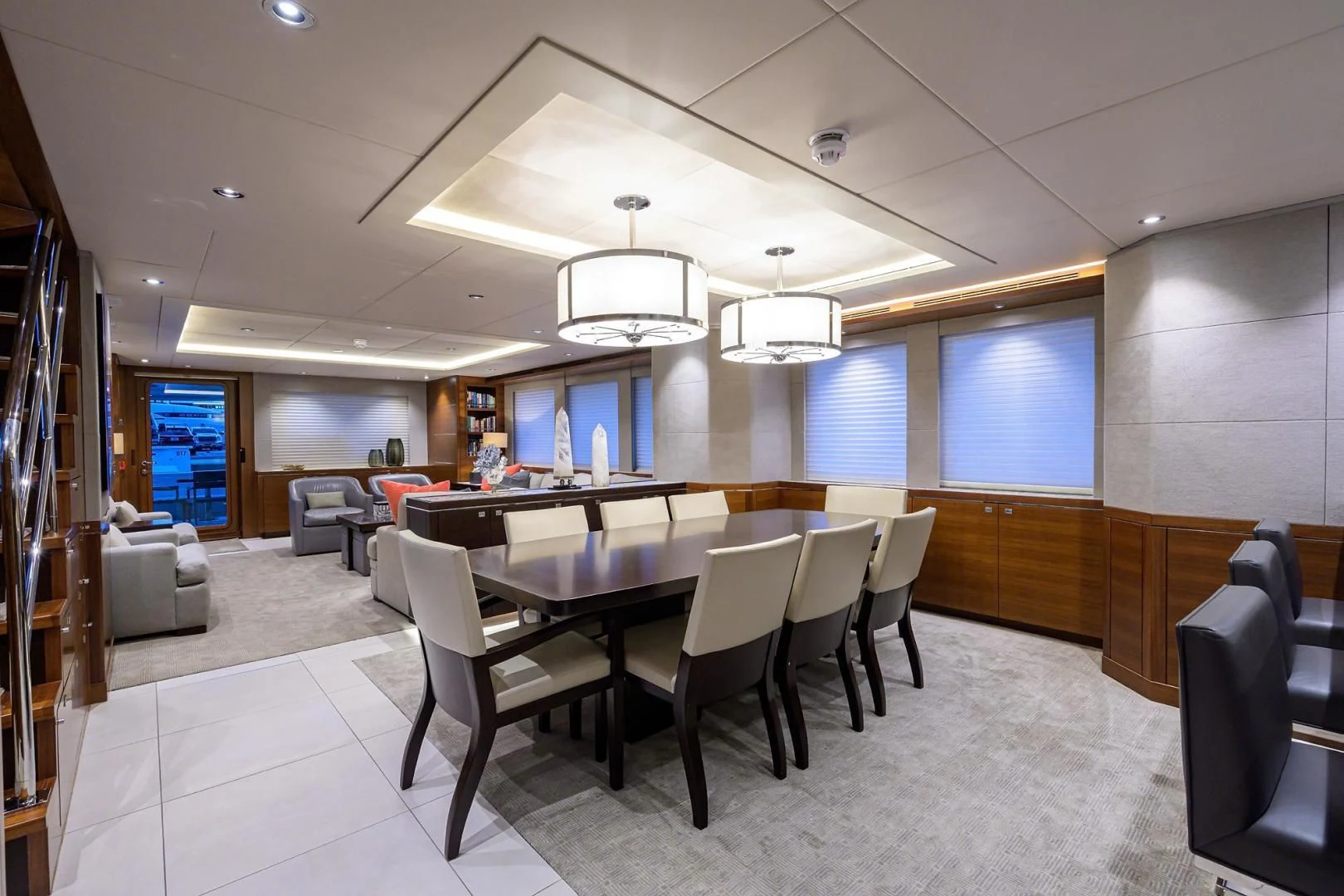 a room with a table chairs and a large window aboard LACEY KAY Yacht for Sale
