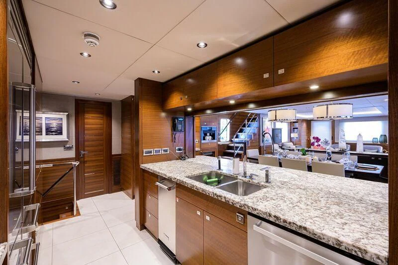 a large kitchen with marble counters aboard LACEY KAY Yacht for Sale