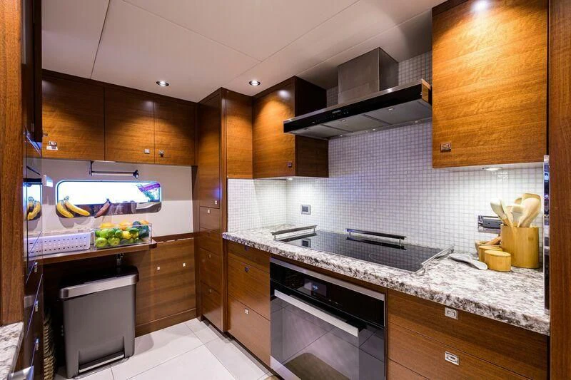 a kitchen with a stove and oven aboard LACEY KAY Yacht for Sale