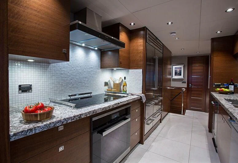 a kitchen with a large island aboard LACEY KAY Yacht for Sale