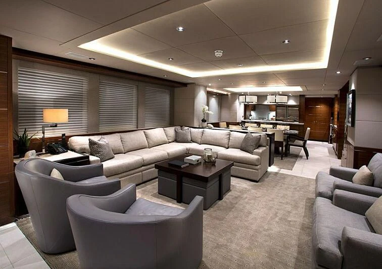 a living room with a couch and a table aboard LACEY KAY Yacht for Sale