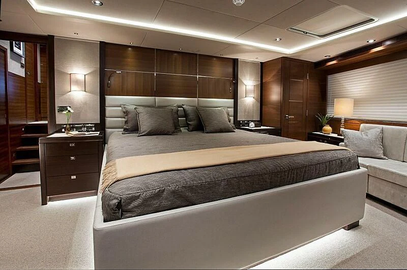 a large bed in a hotel room aboard LACEY KAY Yacht for Sale