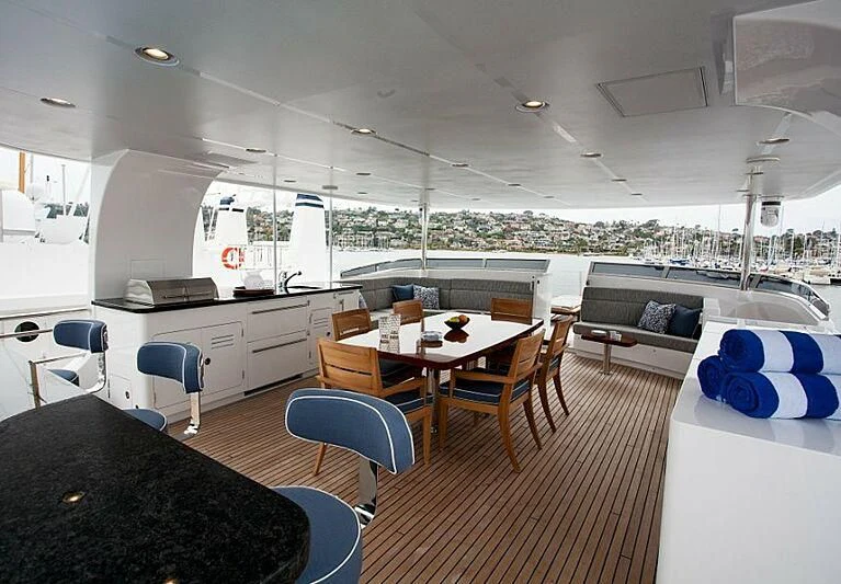a large kitchen with a large window aboard LACEY KAY Yacht for Sale