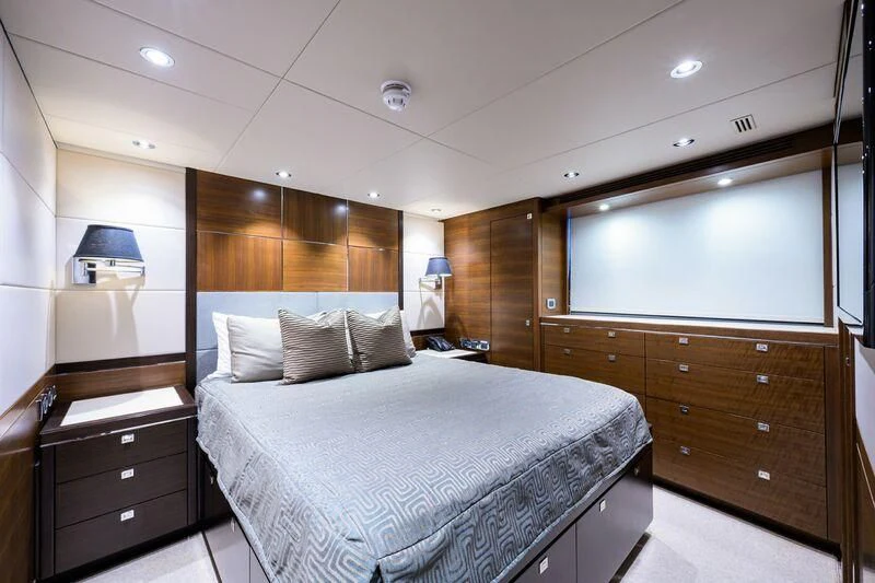 a large bedroom with a large bed aboard LACEY KAY Yacht for Sale