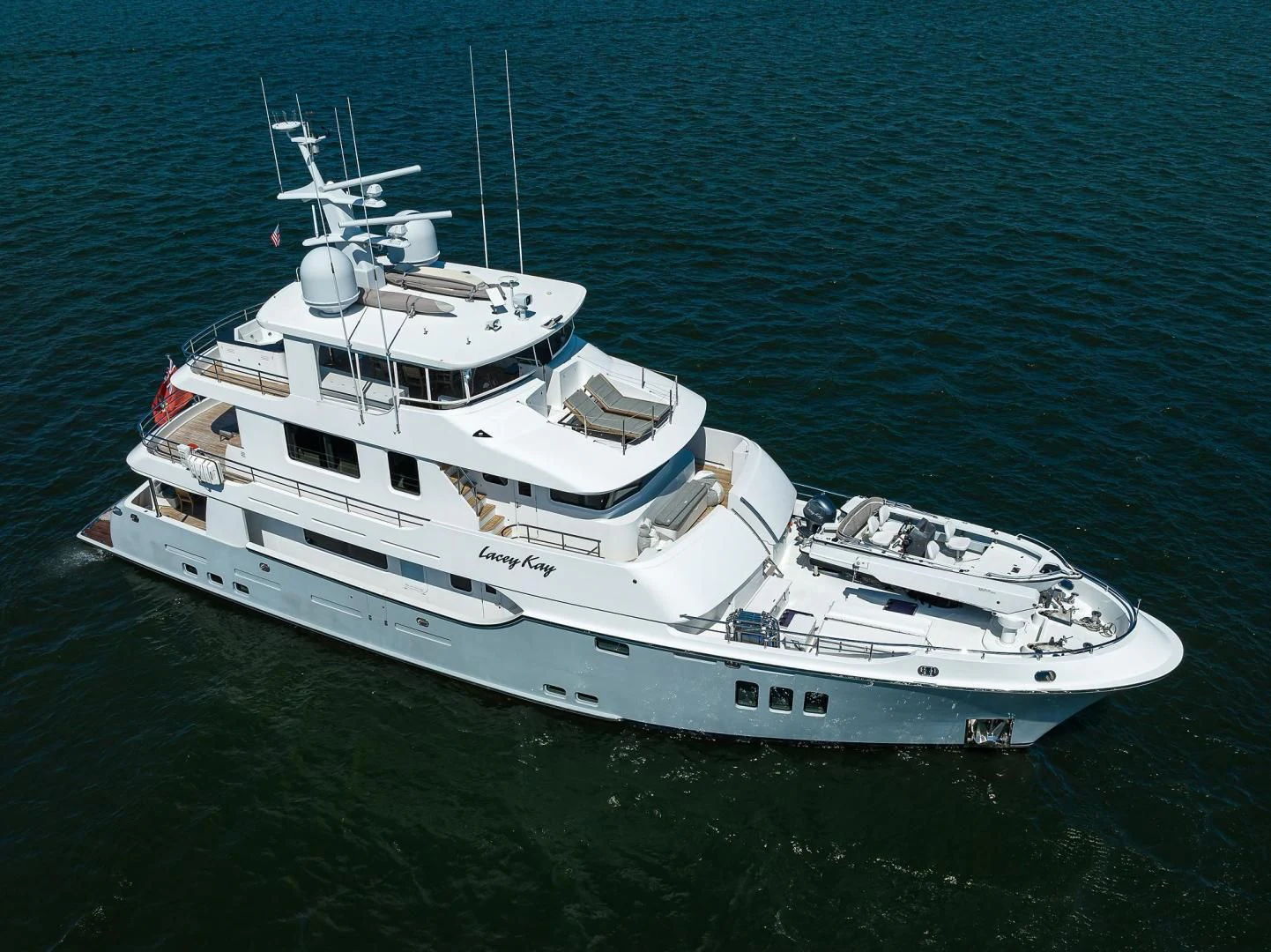 a white boat in the water aboard LACEY KAY Yacht for Sale