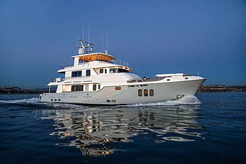 a white boat on the water aboard LACEY KAY Yacht for Sale