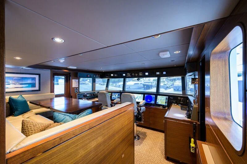inside of a vehicle with a large window and a view of the water aboard LACEY KAY Yacht for Sale