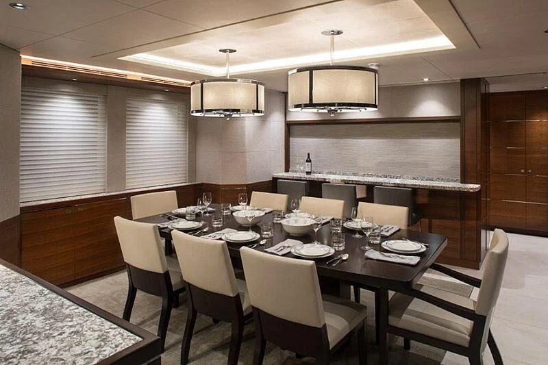 a large dining table in a kitchen aboard LACEY KAY Yacht for Sale