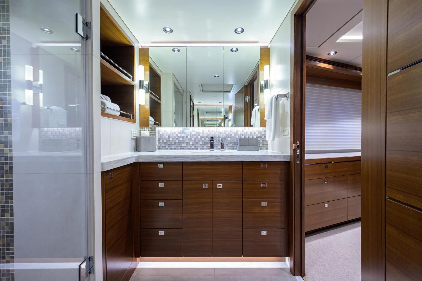 a bathroom with a large mirror aboard LACEY KAY Yacht for Sale