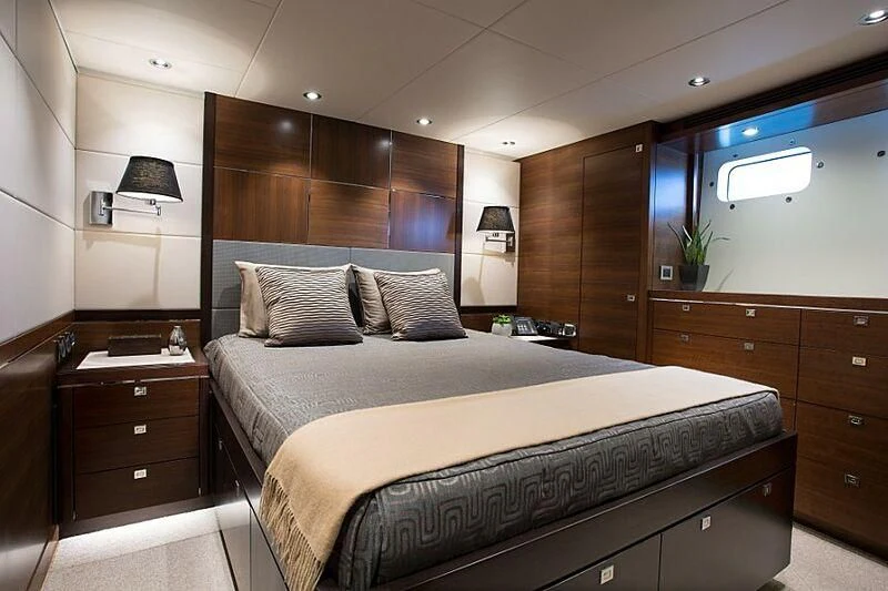 a bed in a room aboard LACEY KAY Yacht for Sale