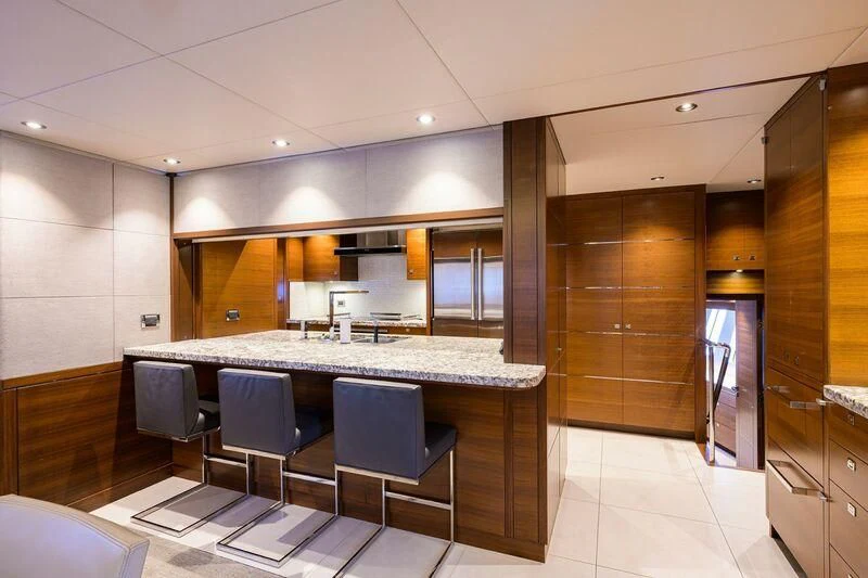 a large kitchen with a large island aboard LACEY KAY Yacht for Sale