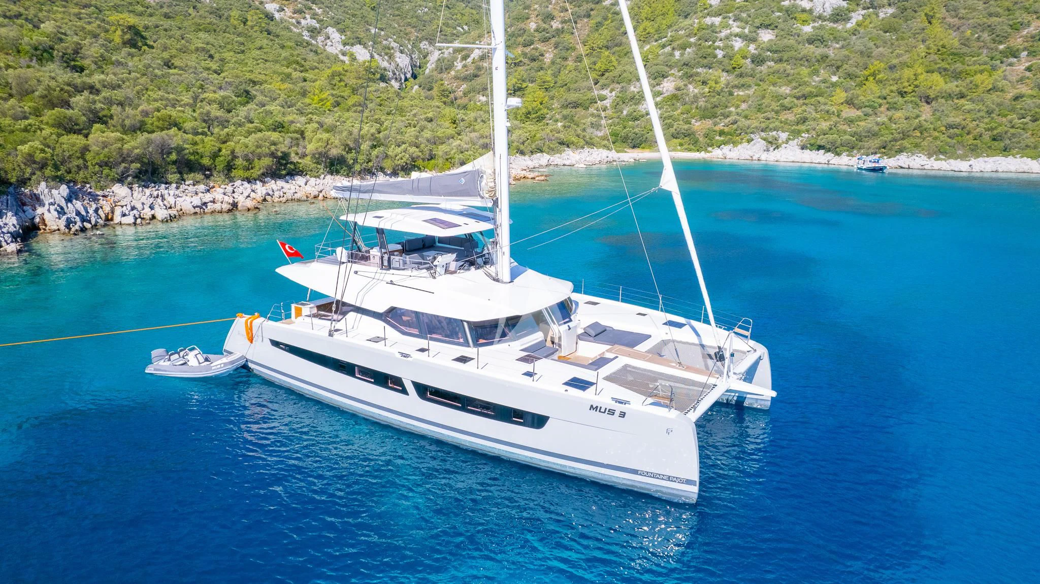 a boat on the water aboard MUS 3 Yacht for Charter