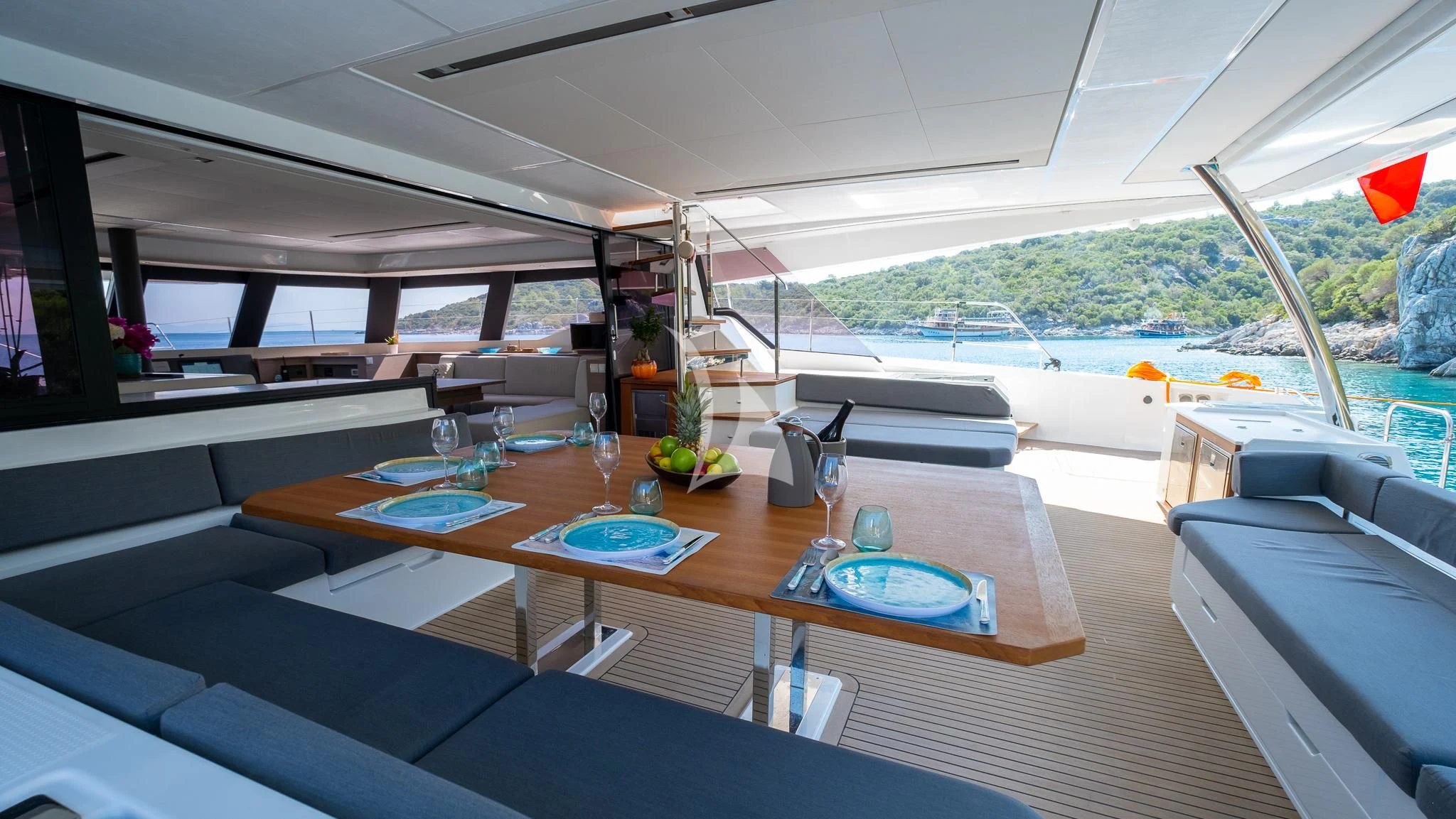 a room with a table and chairs aboard MUS 3 Yacht for Charter