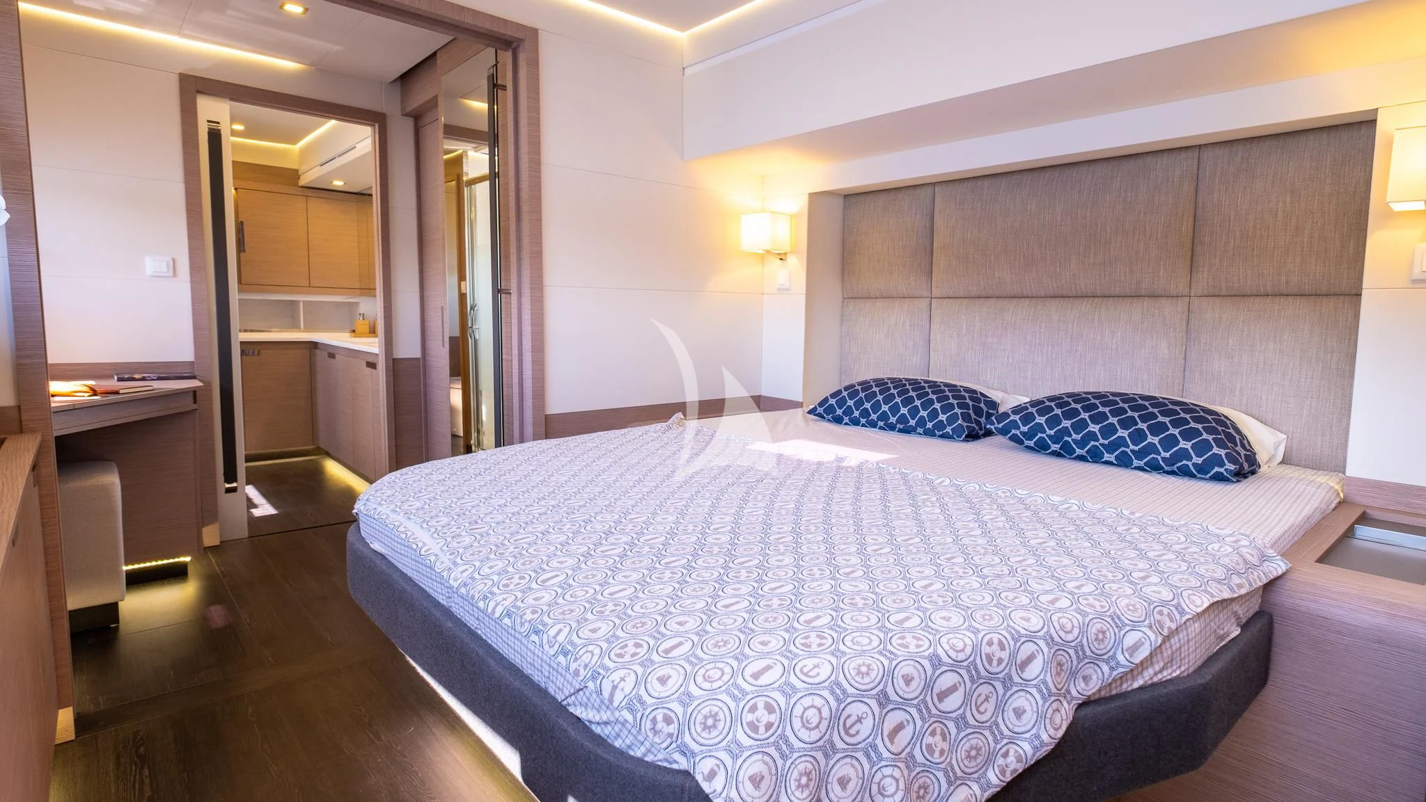 a large bed in a hotel room aboard MUS 3 Yacht for Charter