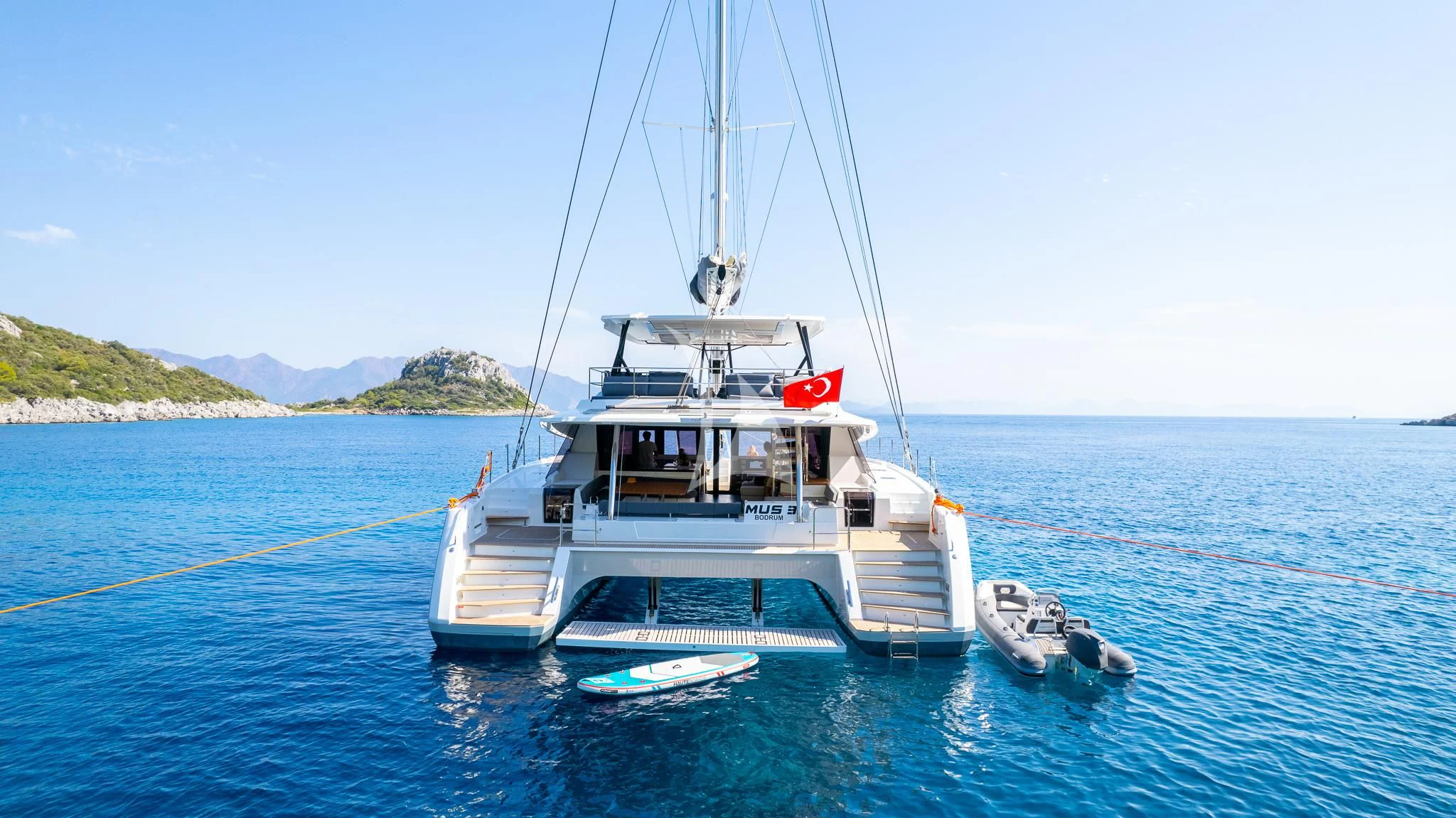 a boat on the water aboard MUS 3 Yacht for Charter