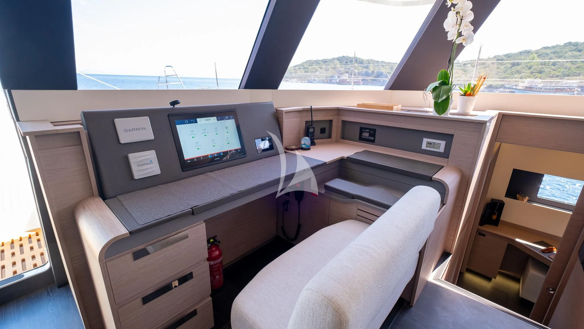 a room with a desk and a chair aboard MUS 3 Yacht for Charter