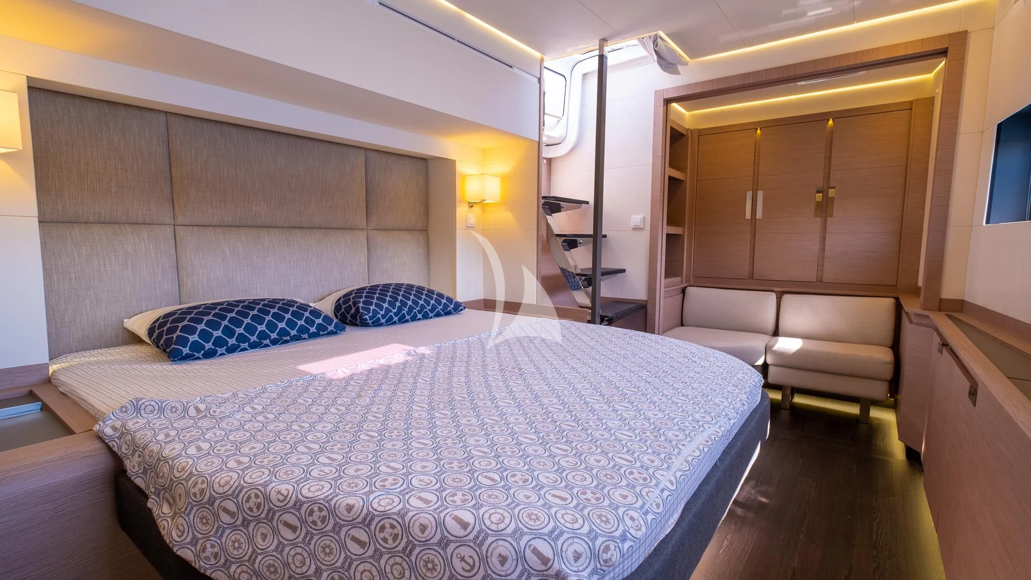 a bed in a room aboard MUS 3 Yacht for Charter