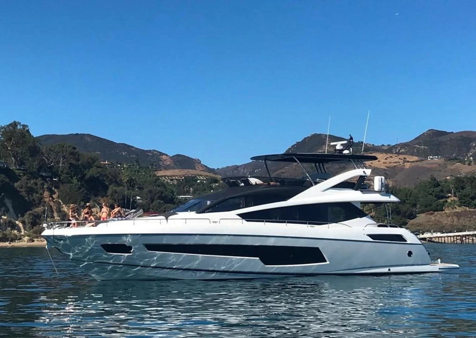 a boat on the water aboard MOJO RISIN Yacht for Sale
