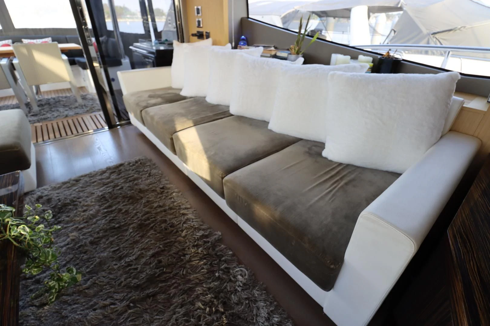 a couch in a room aboard MOJO RISIN Yacht for Sale
