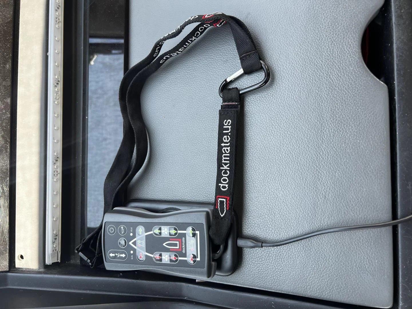 a black and silver key chain aboard MOJO RISIN Yacht for Sale