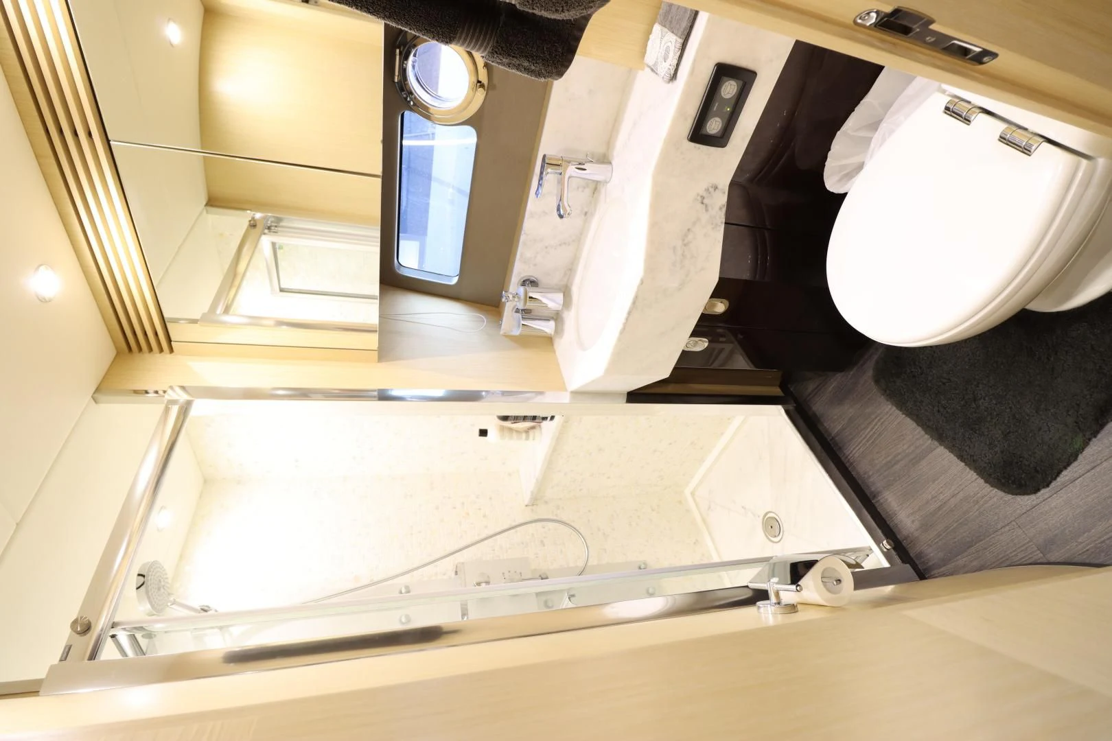 a bathroom with a tub and toilet aboard MOJO RISIN Yacht for Sale