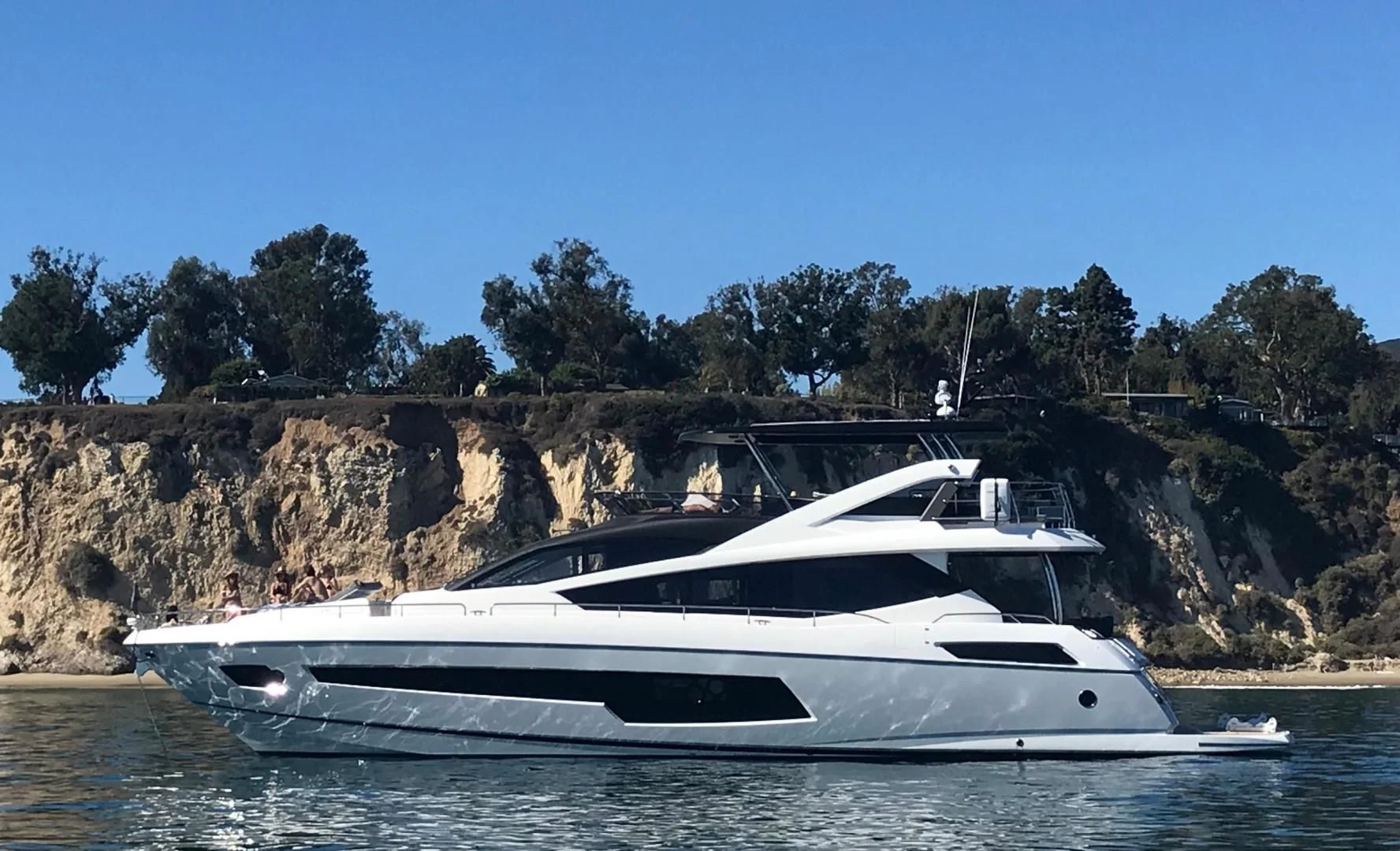 a boat on the water aboard MOJO RISIN Yacht for Sale