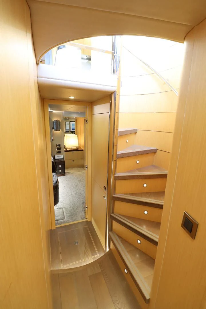 a room with a mirror and a closet aboard MOJO RISIN Yacht for Sale