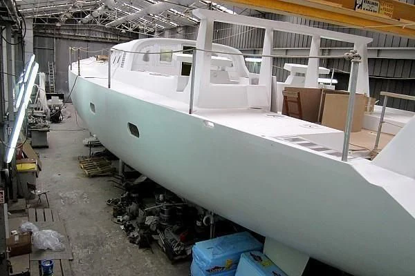 a large white airplane in a warehouse aboard GARCIA 110 Yacht for Sale