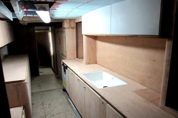 a bathroom with a sink and cabinets aboard GARCIA 110 Yacht for Sale