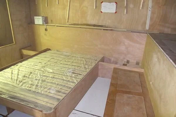 a bed in a room aboard GARCIA 110 Yacht for Sale