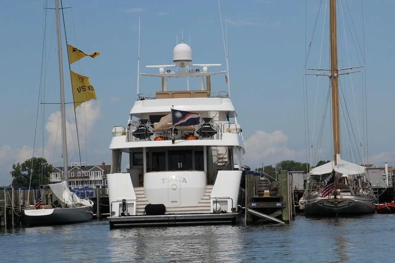 a boat docked at a pier aboard TSALTA Yacht for Sale