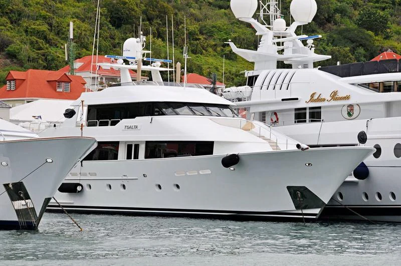 a couple of white yachts aboard TSALTA Yacht for Sale
